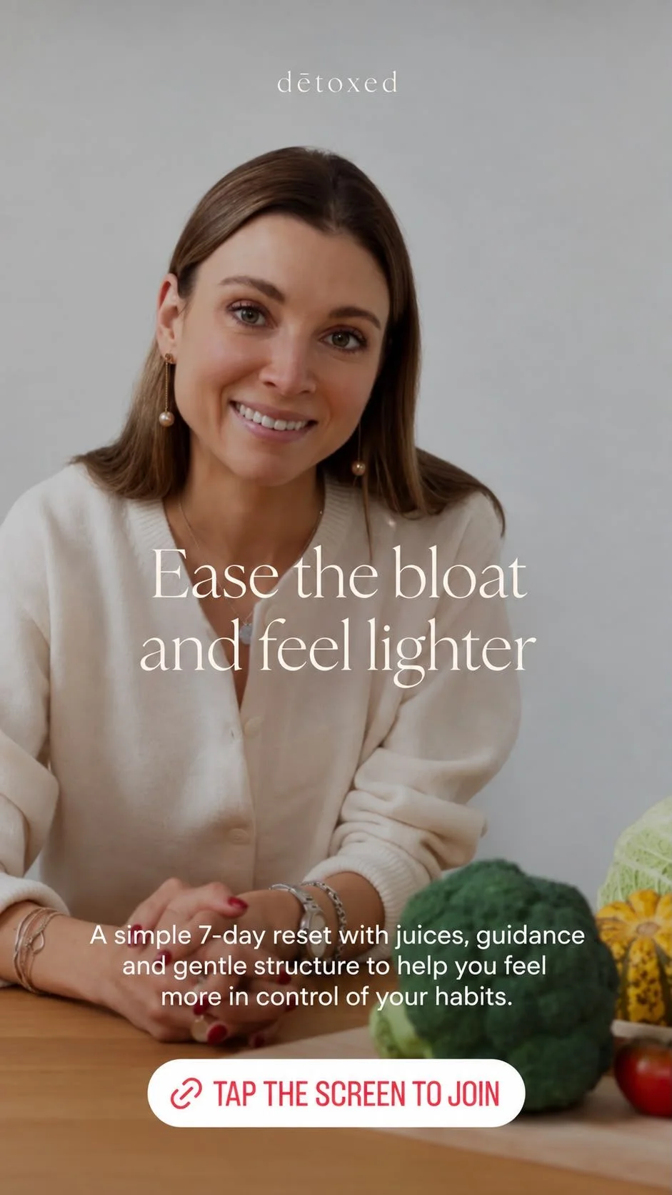 Victoria Everest in a cream cardigan